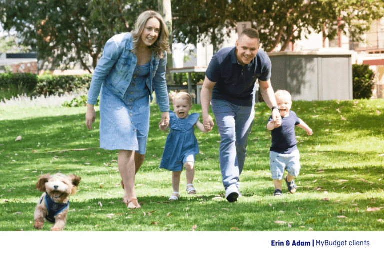 MyBudget clients Erin and Adam enjoying time in the park with their two toddlers and dog Sunny, highlighting budgeting for pet ownership in New Zealand.