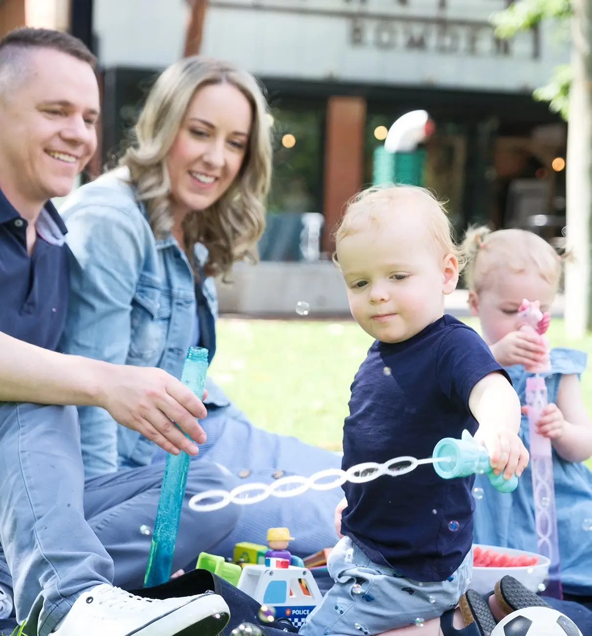 MyBudget clients Erin and Adam spending precious family time after getting their finances back on track with budgeting support and saving for big goals like a house deposit in New Zealand.