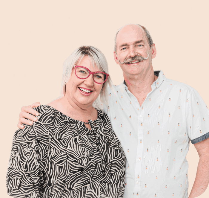 MyBudget clients Kylie and Scott celebrating financial freedom after 18 years of support for budget planning and debt solutions in New Zealand.