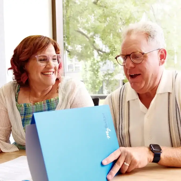 MyBudget clients Michelle and Phil attending a financial coaching and debt solutions appointment in New Zealand.