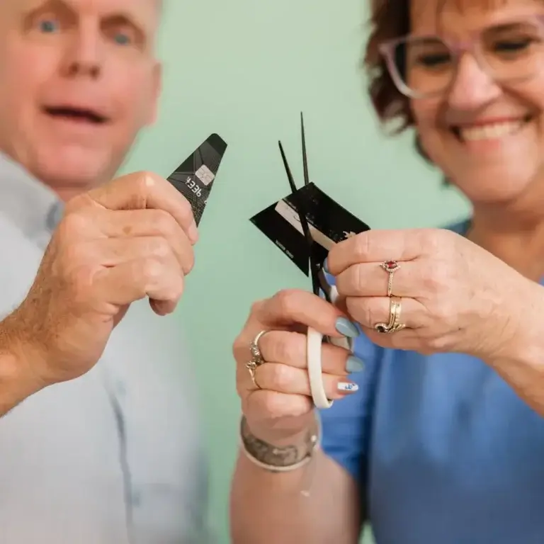 MyBudget clients Michelle and Phil pay off credit cards, find debt relief and financial freedom in New Zealand with a tailored personal budget.
