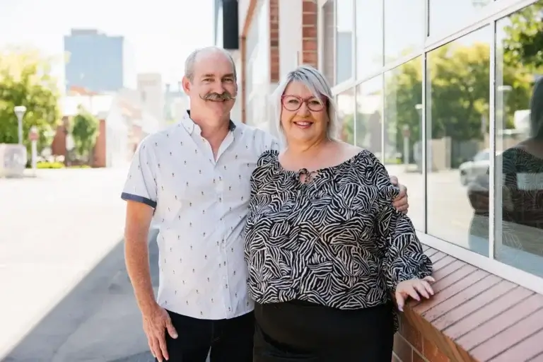 Kylie and Scott, MyBudget clients, celebrating getting ahead with their finances and working towards their financial goals.